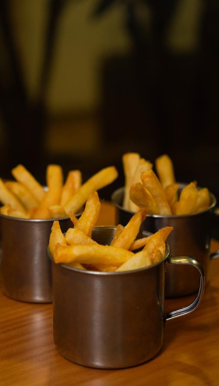 Batatas fritas na caneca